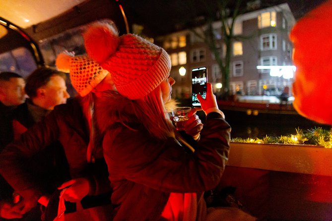 Amsterdam Evening Canal Cruise with Live Guide and Onboard Bar - Electric boat + live narration + onboard bar: the rhythm of the trip
