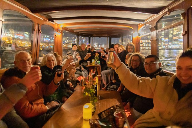 Amsterdam Evening Canal Cruise with Live Guide and Onboard Bar - Boat type surprises: closed vs open, and why it affects what you see