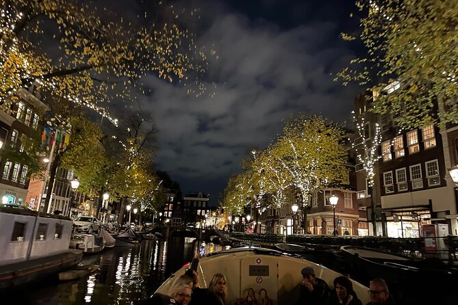 Amsterdam Evening Cosy & Small Cruise & Drinks and Bites - Sunset - Electric boat at night, what the cruise feels like in 90 minutes