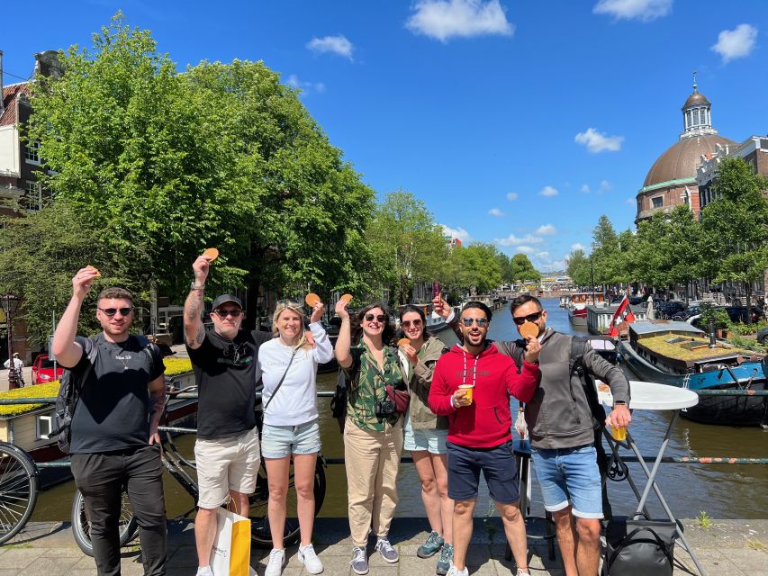 Amsterdam: Food Tour with Drinks by Spui, Canals and Jordaan - Jordaan walking, then street snacks for the final push