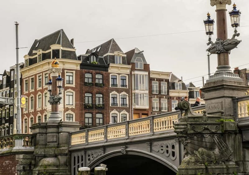 Amsterdam: German Canal Cruise with Unlimited Drinks Option - Comfort, Electric Power, and All-Weather Reality