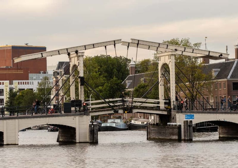 Amsterdam: German Canal Cruise with Unlimited Drinks Option - Who This Tour Suits Best on a Tight Amsterdam Schedule