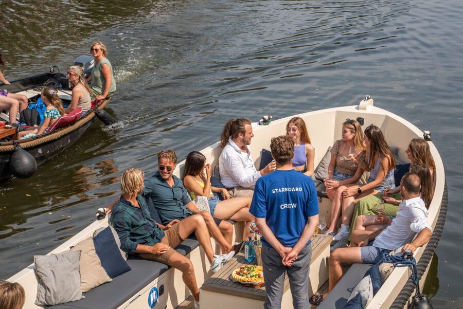 Amsterdam: German Guided Canal Cruise with on Board Bar - Starboard Dock near Rembrandtplein, and arriving on time