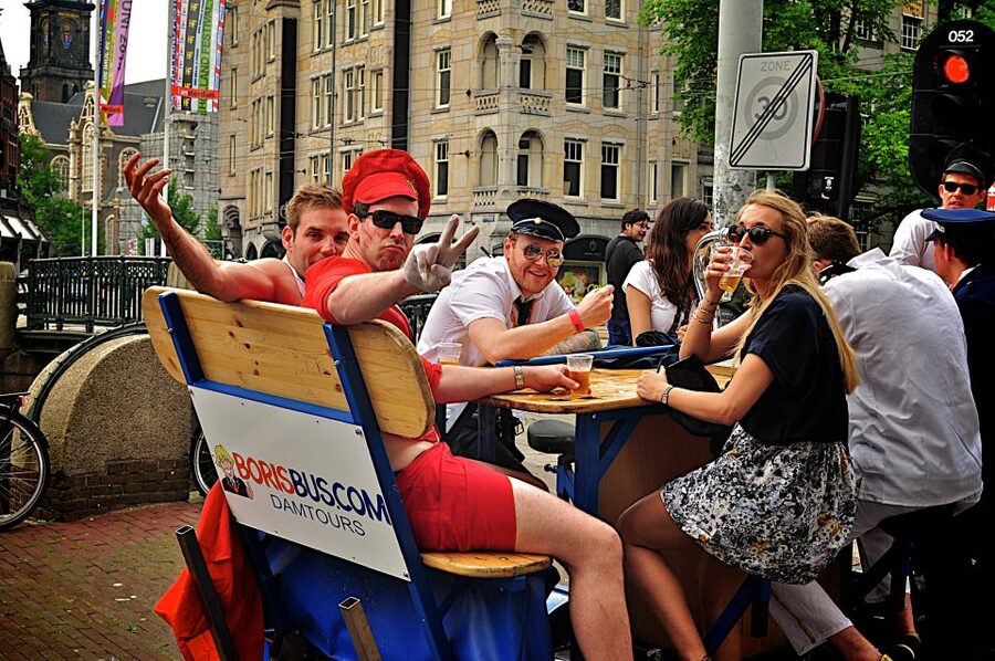 Amsterdam: Guided Beer Bike or Prosecco Bike Tour - The pacing in real life: pedal, then let the driver handle it