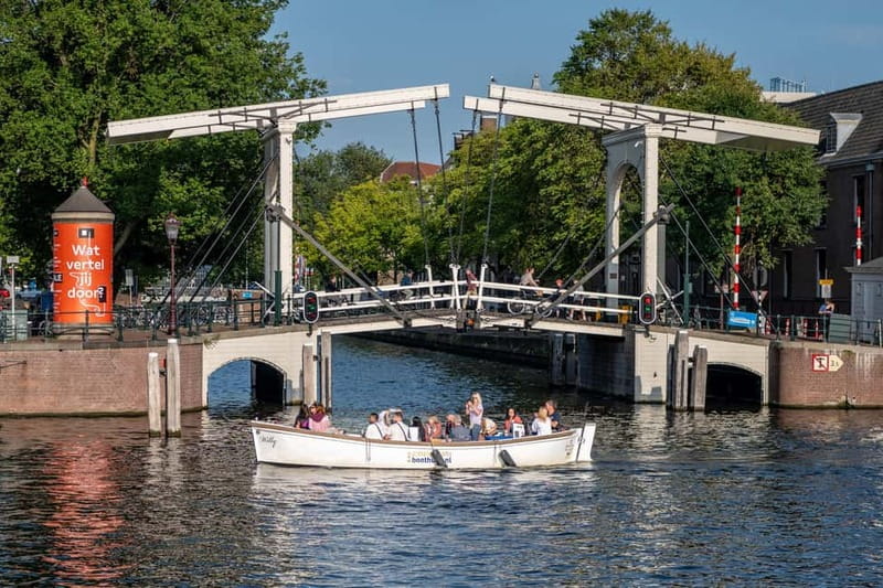 Amsterdam: Guided City Highlights Open Boat Canal Cruise - Westerkerk and Prinsengracht: UNESCO Canals, Viewed Up Close