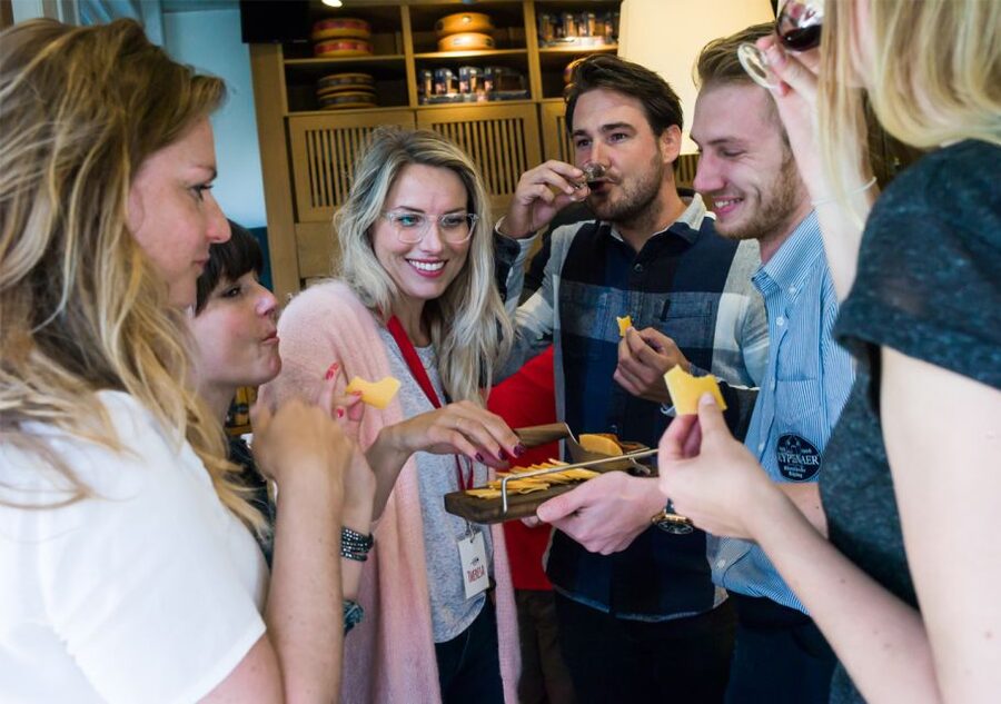 Amsterdam: Guided Cultural Food Tour in English or German - Magna Plaza and the Grachtengordel, Where Amsterdam Icons Meet the Taste Stops