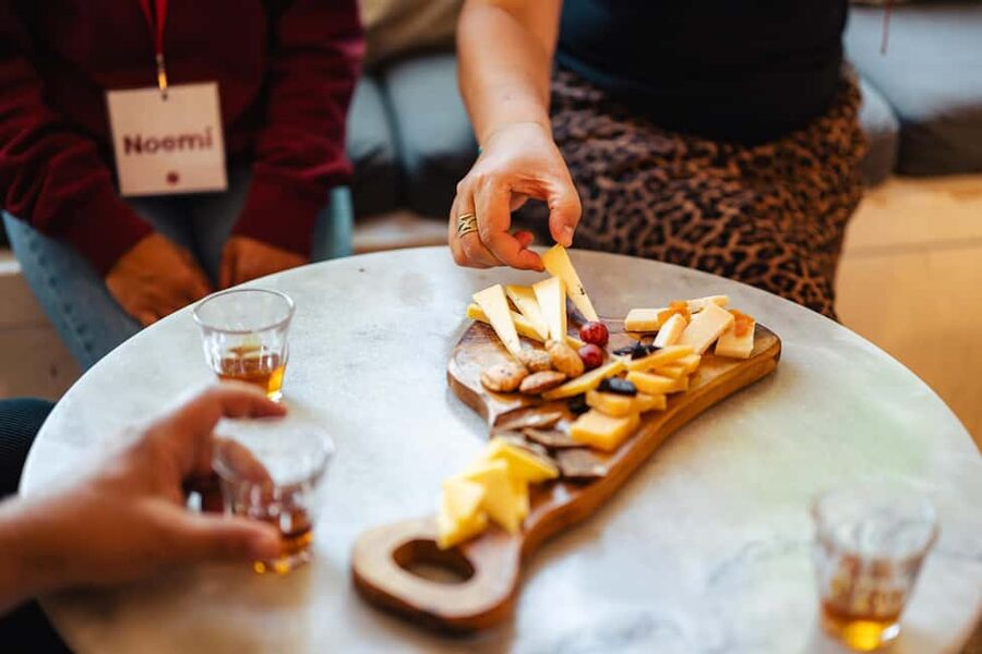 Amsterdam: Guided Cultural Food Tour in English or German - Meeting at the National Monument, then Turning Dam Square into Your First Story