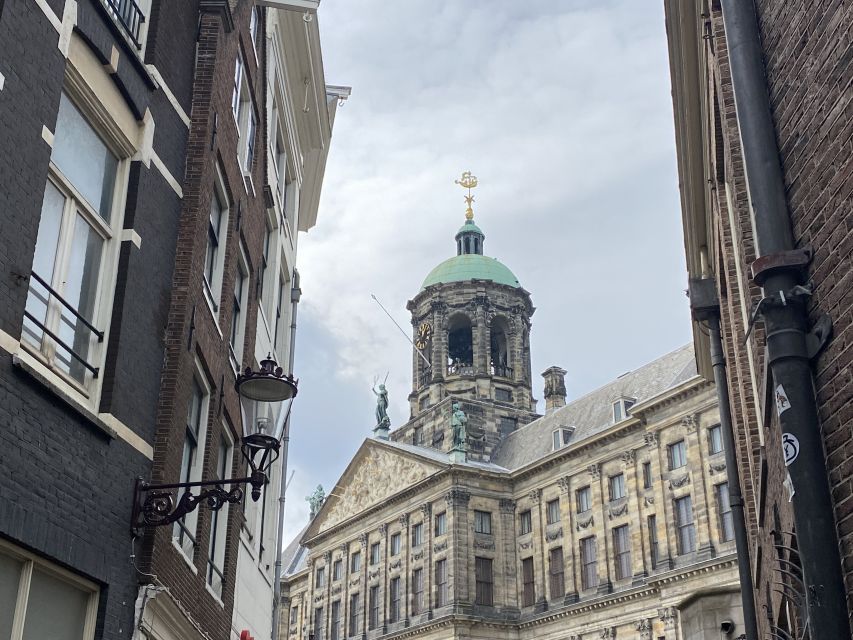 Amsterdam: Guided Off-The-Beaten-Track Walking Tour - Walking the Golden Age canals: architecture details, not just views