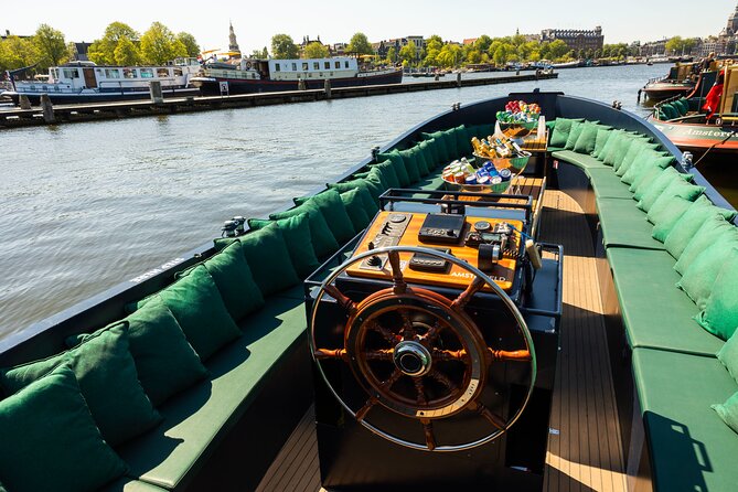 Amsterdam: Guided Open Boat Canal Cruise Unlimited Drinks Option - Key things to know before you board