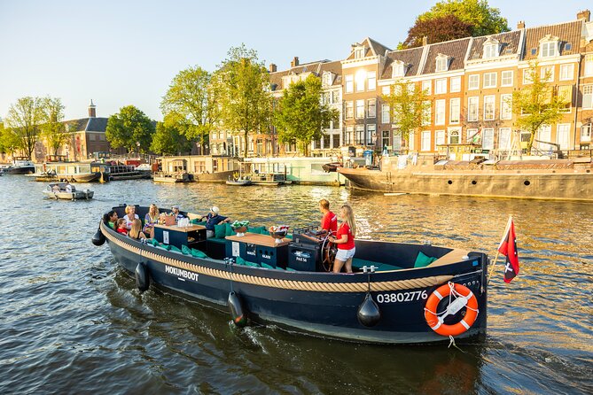 Amsterdam: Guided Open Boat Canal Cruise Unlimited Drinks Option - Jewish Amsterdam and the Canal Belt Details You Can Spot From the Water