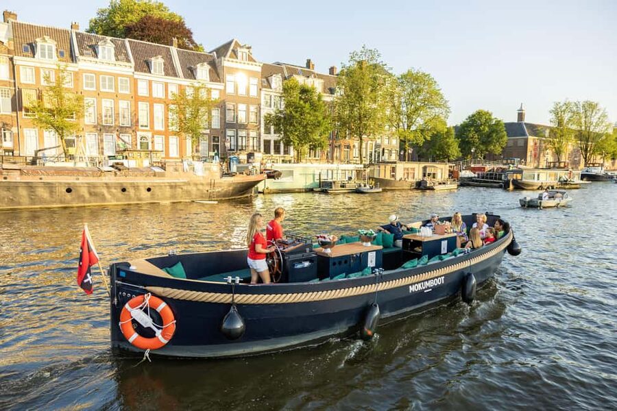 Amsterdam: Guided Open Boat Cruise Unlimited Drinks Option - From Sea Palace to the Maritime Museums: Big Sights in a Single Pass