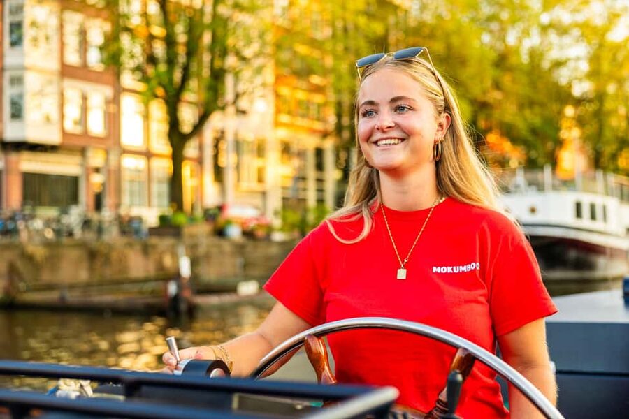 Amsterdam: Guided Open Boat Cruise Unlimited Drinks Option - Jewish Cultural District, Rembrandthuis, and the Life Around Waterlooplein