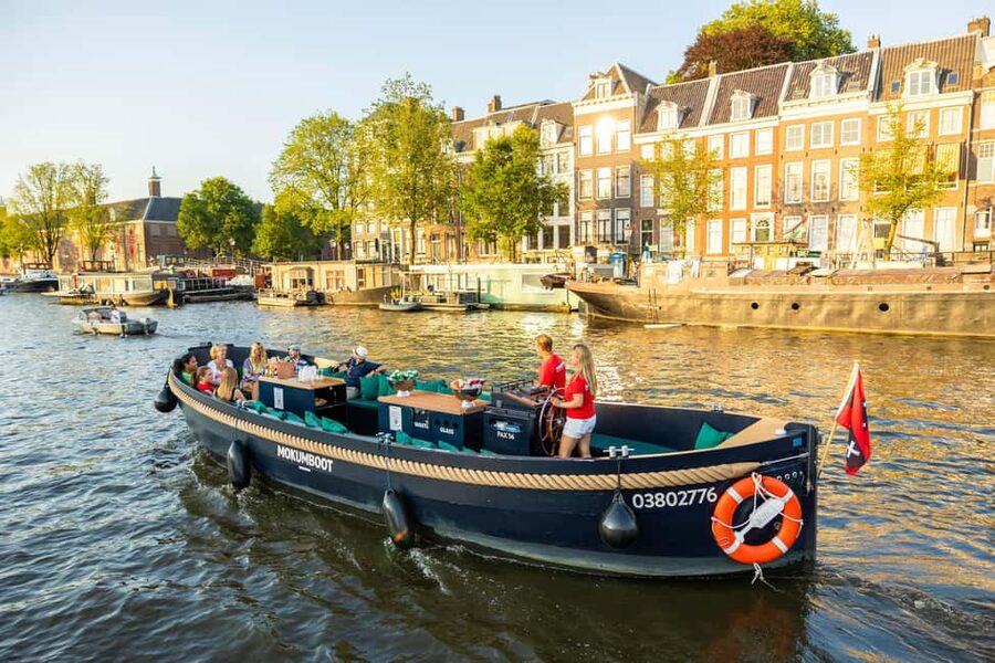 Amsterdam: Guided Open Boat Cruise Unlimited Drinks Option - Unlimited Drinks Option: Fun If You Drink, Risky If You Don’t
