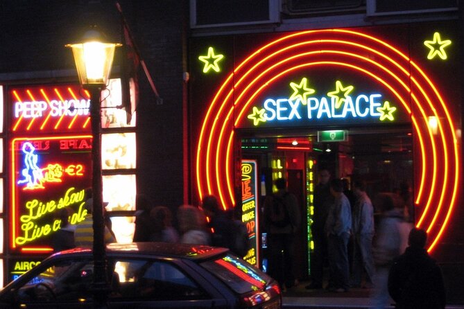 Amsterdam: Guided Red Light District and City Walking Tour - Condomerie and the bold cultural contrast at the end