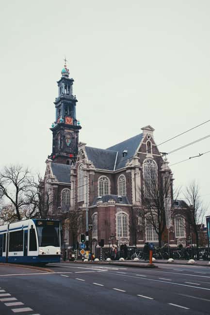 Amsterdam: Hidden Gems and Highlights in DE/EN/IT - Café Sonneveld and Scenic Breaks That Help the Walk Make Sense