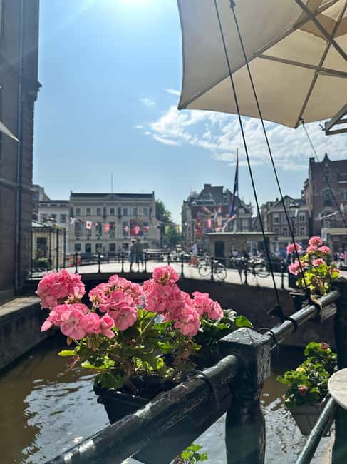 Amsterdam: Hidden Gems Walking Tour with a Local Guide - Haarlemmerbuurt and Dam Square: the classic center with side-street context