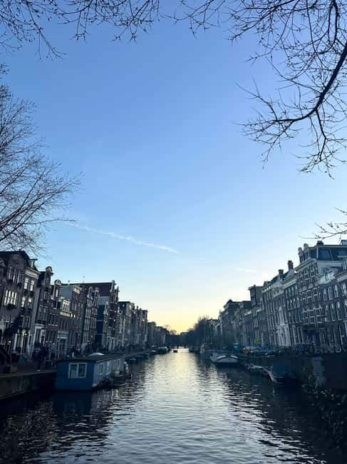 Amsterdam: Hidden Gems Walking Tour with a Local Guide - Artis Zoo, the Amstel, Heineken, and Lucas Bols: culture through places, not performances