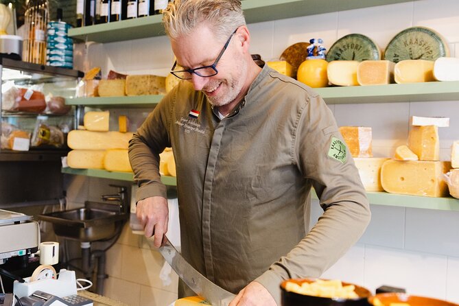 Amsterdam High-End Dutch Food & History Tour - Up to 8 guests - Fish Counter Classics: Herring, Fried Cod, Smoked Eel