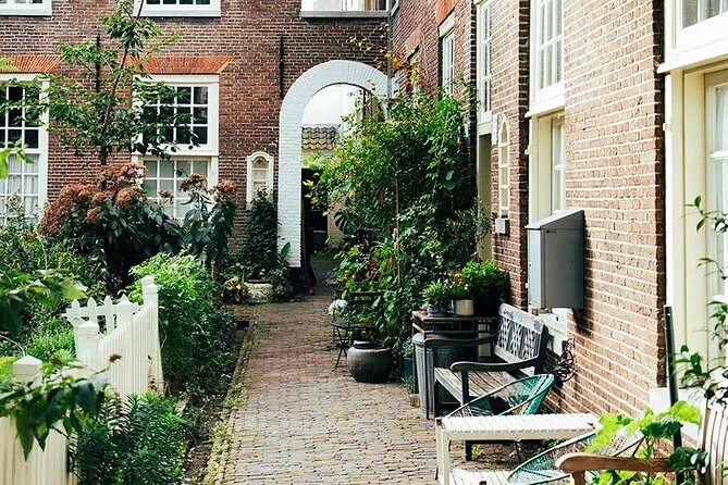Amsterdam High-End Dutch Food & History Tour - Up to 8 guests - Deli and Butcher Stops: Grillworst, Ossenworst, and Croquettes