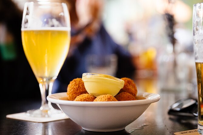 Amsterdam High-End Dutch Food & History Tour - Up to 8 guests - Indonesian Layers: Javanese Satay and Spekkoek
