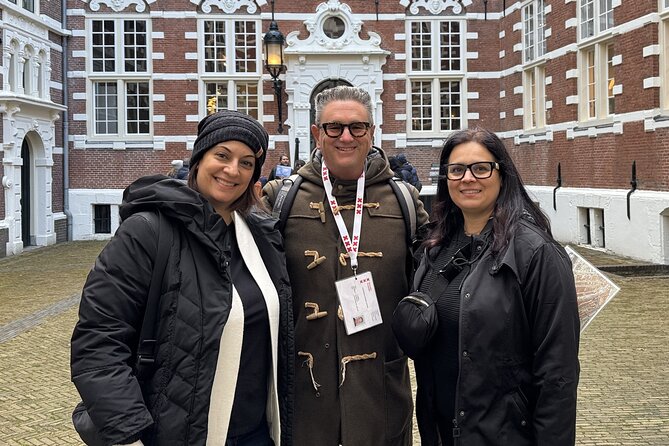 Amsterdam Highlights and Hidden Gems Walking Tour with Fun Guide - Stop 2: Old Harbor Area Secrets and the Feel of a Working City