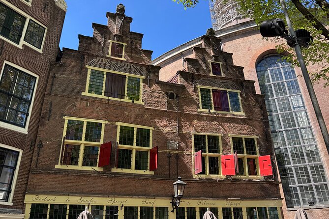 Amsterdam Highlights and Hidden Gems Walking Tour with Fun Guide - Stop 5: The Jordaan Stroll Toward Westerkerk and a Pass by Anne Frank House