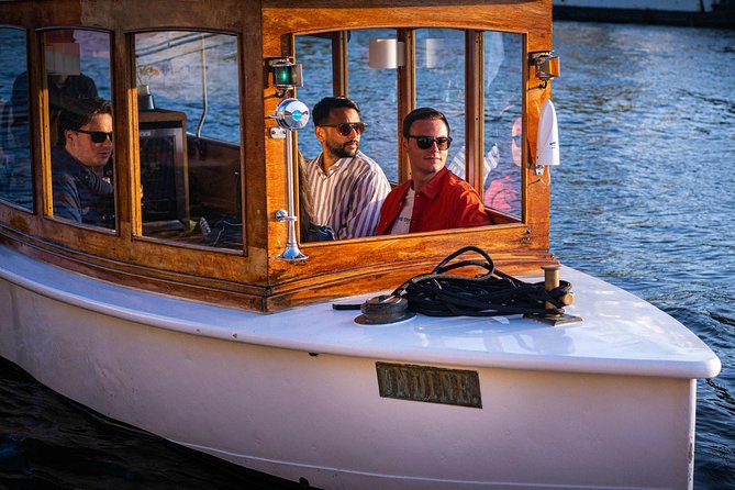 Amsterdam Highlights Canal Cruise with a Drink - Why a Private Wine Canal Cruise Feels Different in Amsterdam