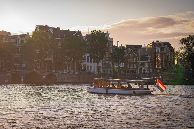 Amsterdam Highlights Canal Cruise with a Drink - The Host Experience: How Guides Like Mark, Carl, Karl, and Bram Change the Trip