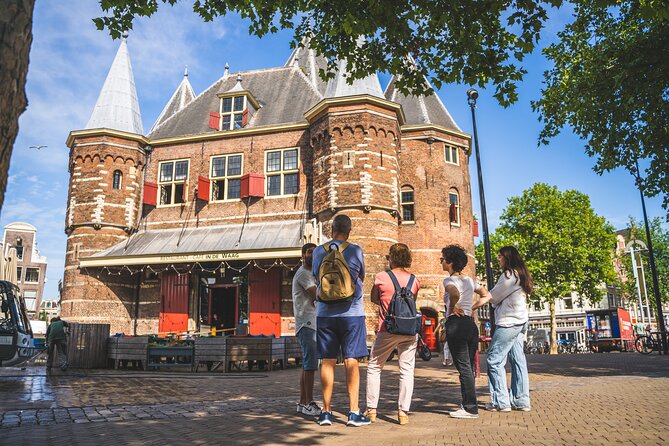 Amsterdam Highlights Small-Group Walking Tour - Begijnhof Gardens by Spui Square: A Quiet Pocket in the Middle of Town