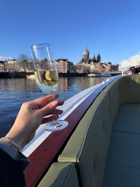 Amsterdam: Historic Boat Cruise with open bar and nibbles - Sophie on the canals, and why “small group” is the real luxury