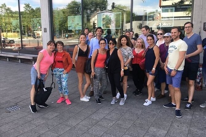Amsterdam Historic Center Walking Tour With A Guide - Small-group pacing, tips, and how to avoid feeling shortchanged