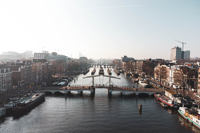 Amsterdam Historic Tour On Classic Saloon Boat - A 1-hour classic canal cruise from Prinsengracht or Prins Hendrikkade