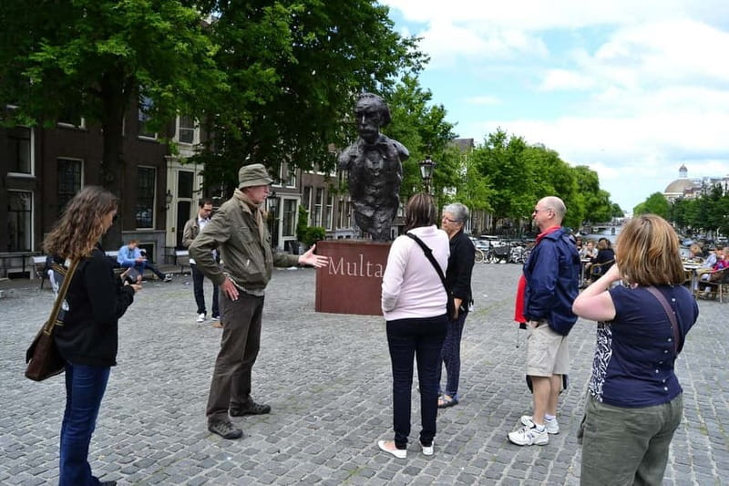Amsterdam: History, Culture & Hidden Gems Walking Tour - Beursplein to Dam Square: the walk that makes Amsterdam coherent