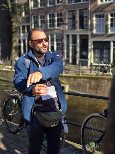 Amsterdam: History, Hidden Gems & Future Eco-Walking Tour - The Foundation: water, windmills, and why Amsterdam exists below sea level