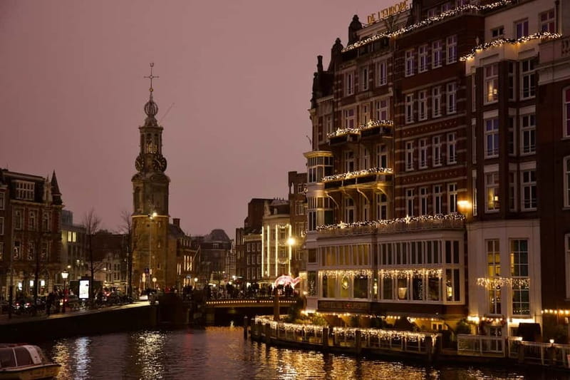 Amsterdam: Iconic Canals & Historic Sights Walking Tour - About the pace, group feel, and what the timing means