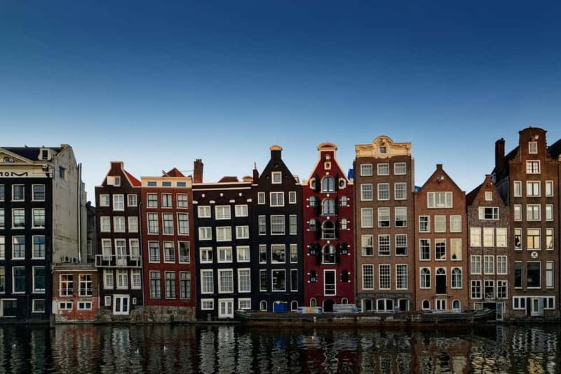 Amsterdam: Iconic Canals & Historic Sights Walking Tour - Oude Kerk in the Red Light District: old stones with real neighborhood meaning