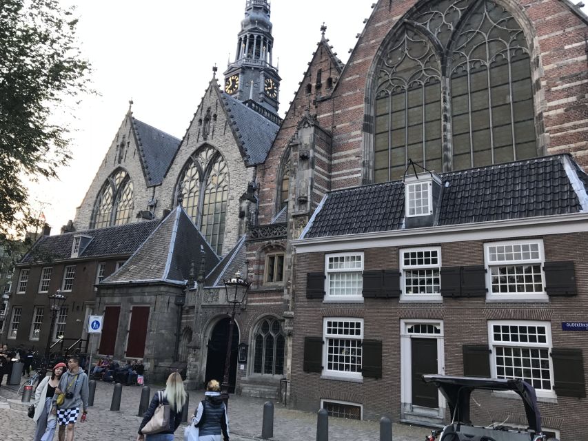 Amsterdam: Introduction walking tour - Dam Square and the Royal Palace area, with a needed pause