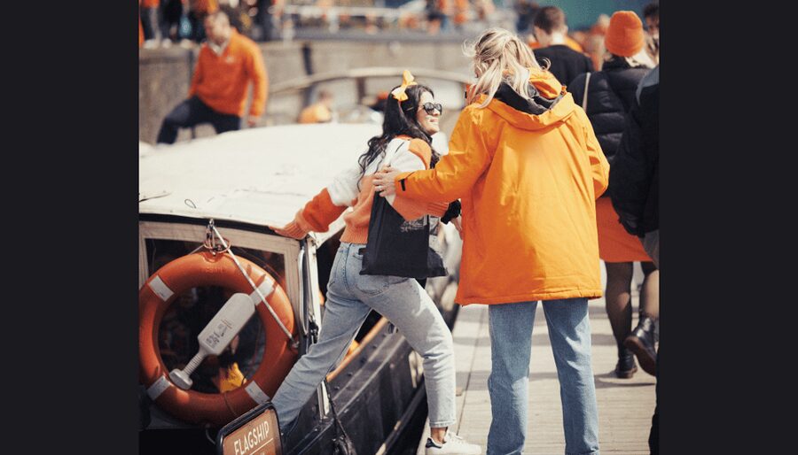 Amsterdam: King's Day Party Cruise with Open Bar & Music - The cruise route in real life: passing sights while you party