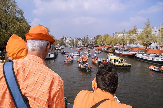 Amsterdam: Kingsday Party Cruise including Drinks - Drinks, music energy, and live on-board narration
