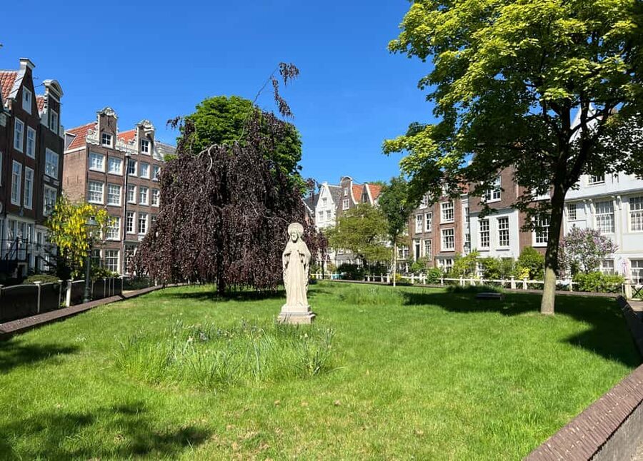 Amsterdam Legends & History Walking Tour with Local Guide - Meeting at Magere Brug: The Skinny Bridge Setup and How You Find the Guide