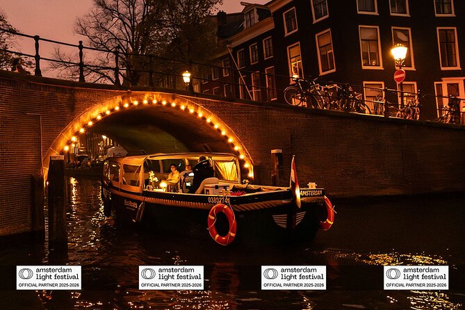 Amsterdam: Light Festival Boat with Unlimited Drinks & Snack - Dress for water chill: half-open vs covered boat reality