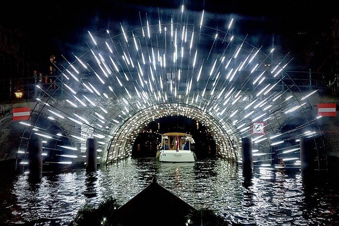 Amsterdam Light Festival: Canal Cruise + Snack & Unlimited Drinks - Flying Dutch Boats and the covered-boat reality check