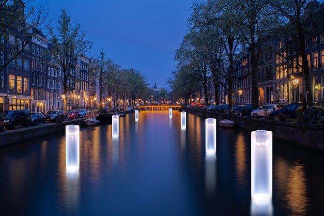 Amsterdam Light Festival Canal Cruise + Unlimited Drinks Option - A heated, guided night that starts right by Central Station