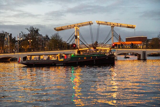 Amsterdam: Light Festival Open Boat - Unl. Drinks Option - The Route Begins With Pierre Cuypers and the Rijksmuseum Connection