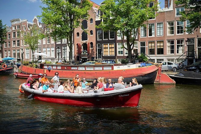 Amsterdam Light Festival: Saloon Boat Cruise + Hot Drinks & Bite - The 75 minutes on the UNESCO Canal Ring, and where the lights hit hardest