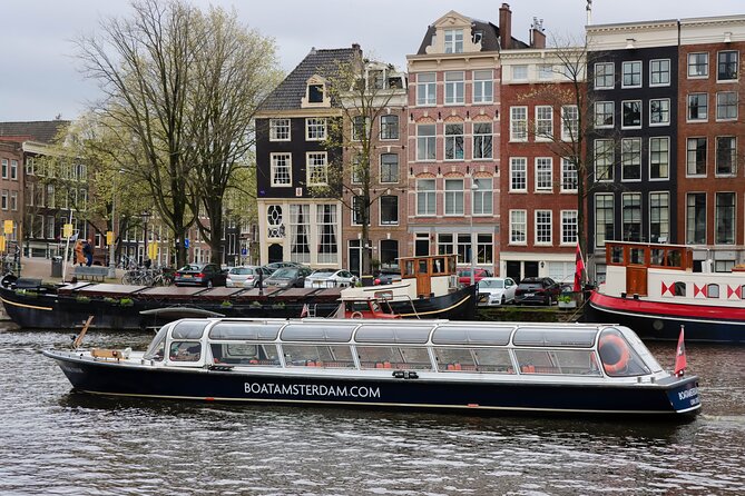 Amsterdam Live Guided Sightseeing Canal Cruise - Landmarks and quirky stops you pass: Anne Frank House area, museums, and canal-side curiosities