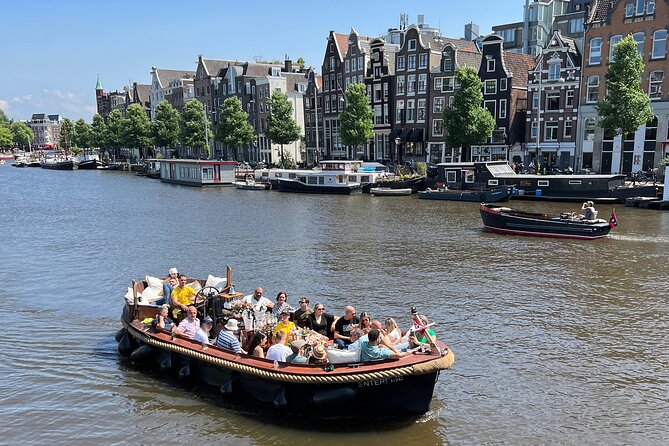Amsterdam Luxury Boutique Boat tour with Unlimited Beer and Wine - The pace: fitting a guided canal loop into your Amsterdam day