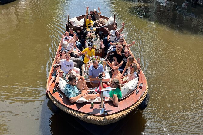 Amsterdam Luxury Boutique Boat tour with Unlimited Beer and Wine - Stop-by sights: De Wallen from the water, not from the sidewalk