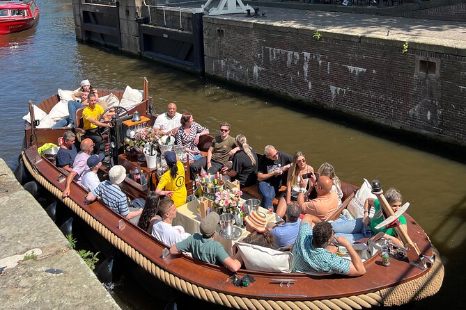Amsterdam Luxury Boutique Boat tour with Unlimited Beer and Wine - Unlimited beer and wine: great value, but verify your exact package