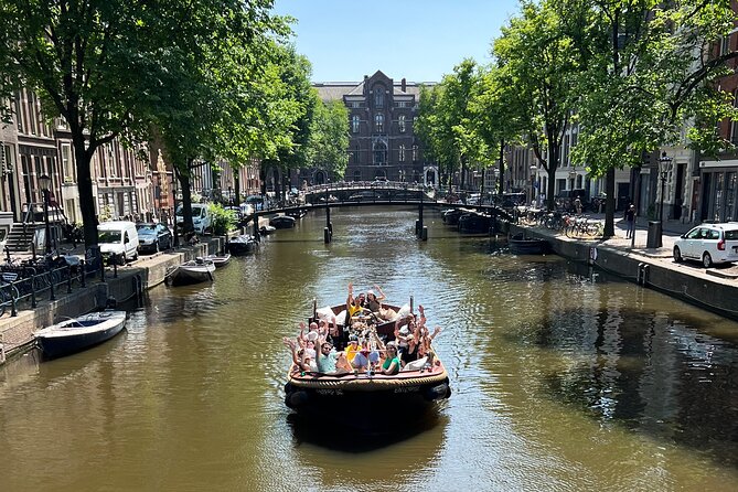 Amsterdam Luxury Boutique Boat tour with Unlimited Beer and Wine - Meeting point on Oudezijds Voorburgwal: start where the action is
